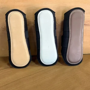 Canillera neopreno con cuero 24 cm doble velcro vista frontal – El Carpincho